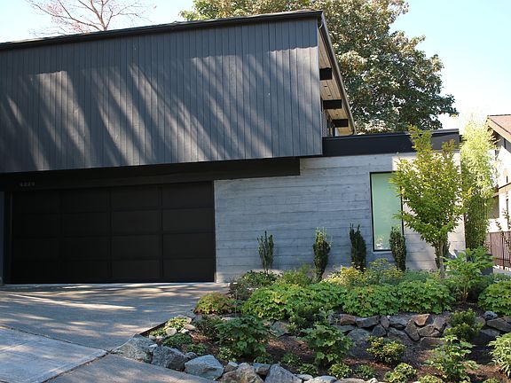 Garage door & pool room.