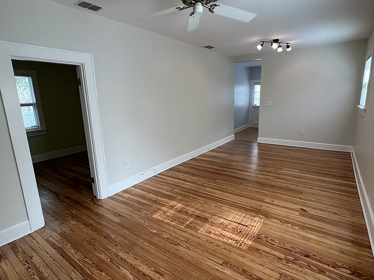 Living room with master bedroom to the left