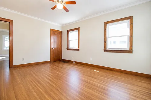 An Adorable 2BR Brick Home with Original Hardwoods, Custom Bath, Full Basement, Yard and 1 Car Ga... — Photo 4