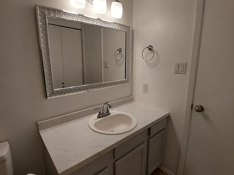 Full bathroom with large linen/storage closet