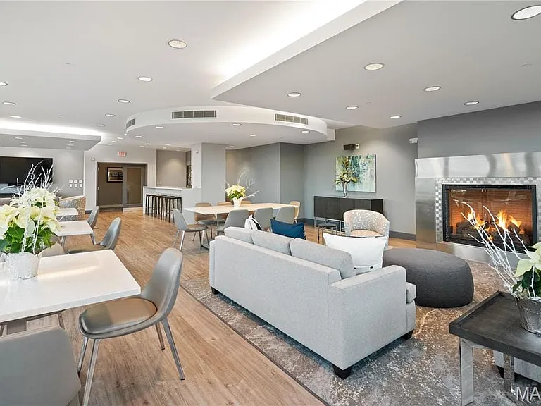 Gas fireplace with sitting area.