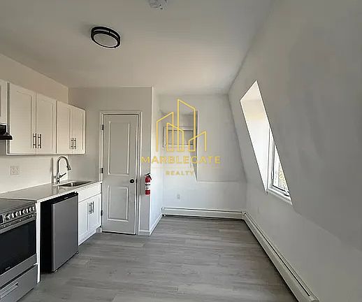 3rd image of 137 W 5th Ave #33B