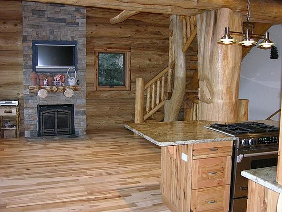 Great Room with Built in Plasma TV over Fireplace