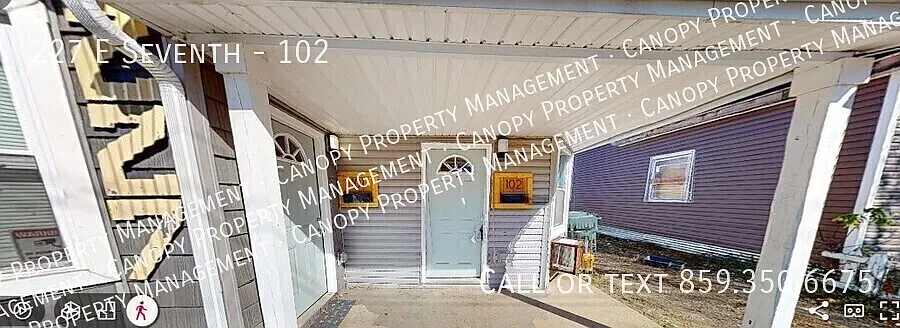 Building Photo - 227 E 7th St #102
