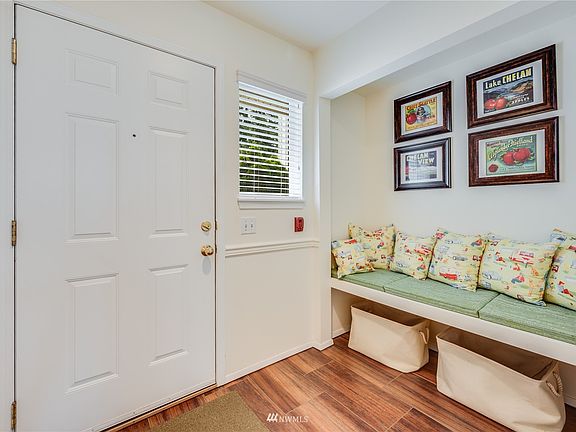 Entry with seating area>