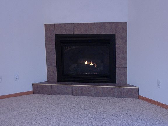 corner fireplace in living room