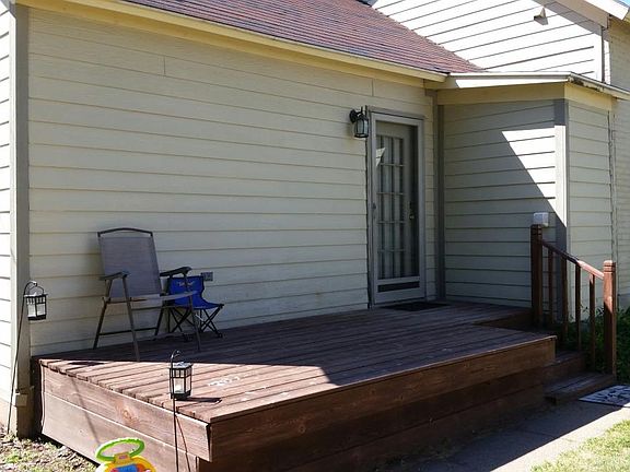 Deck in fenced in yard