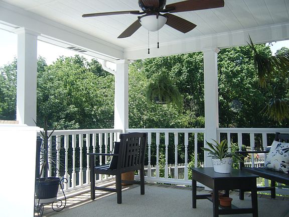 southern style back porch overlooking pool