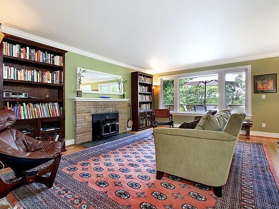Large living room with oak hardwood floors. All new windows throughout.