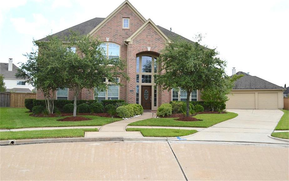 This gorgeous home sits on a cul-de-sac street, The three car garage has a pull down ladder and deck