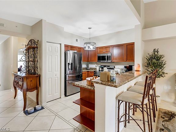 3rd image of 10110 Villagio Palms Way Unit 206