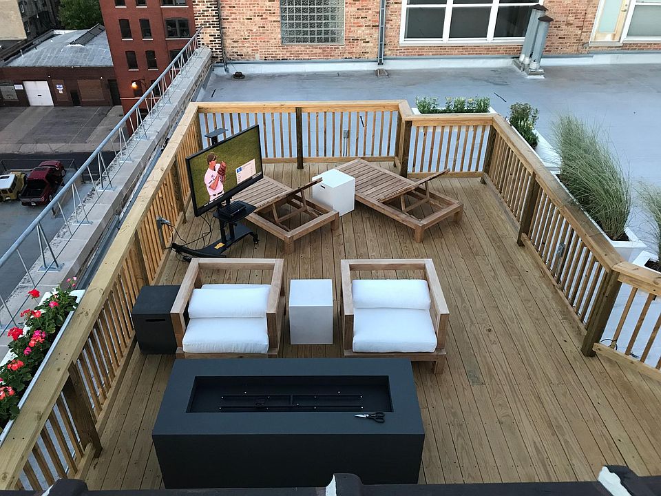 Private roof deck with east facing view of the city.