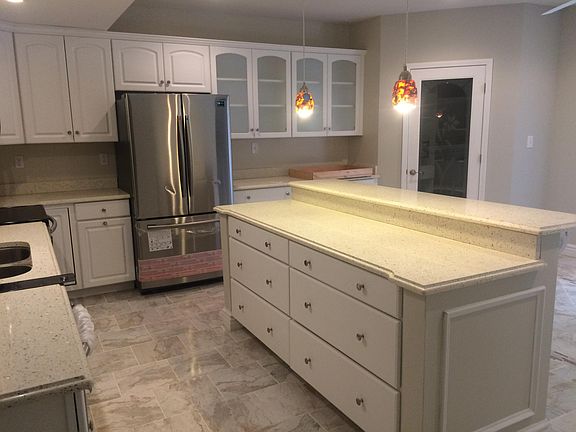 Spacious Kitchen with designer pantry. Pull out cabinets shelves.