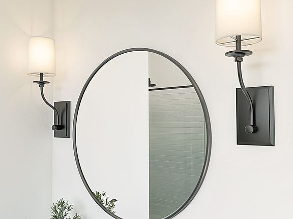 Matte black mirrors in primary bath