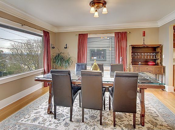 Dining Room.  Beautiful crown molding and picture rail throughout main floor.