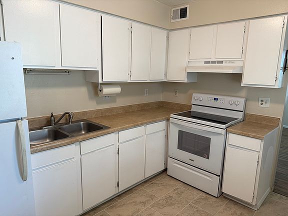 Kitchen with new porcelain tile floor