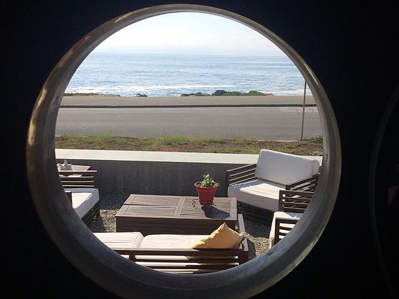 porthole front door in custom made design by local craftsman