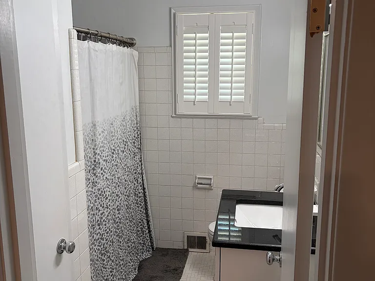 Full bath with linen closet