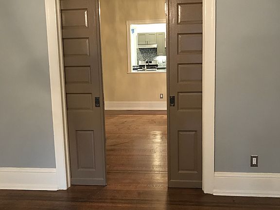 First Floor Living and Dining Rooms - Original Pocket Doors!