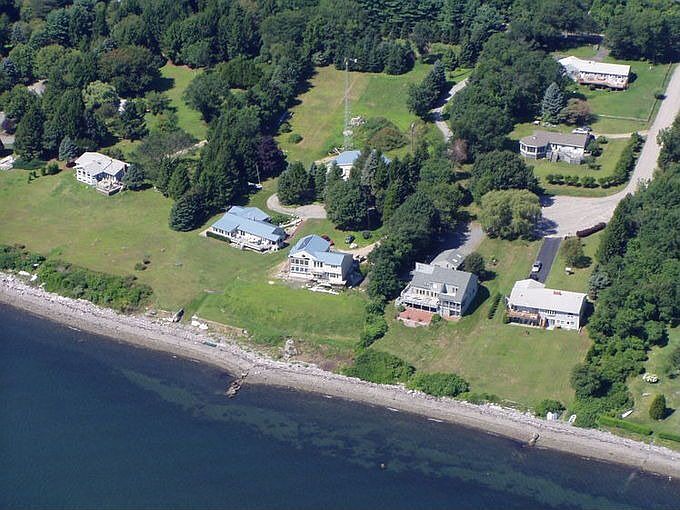 Beach House Is Blue Roof On LT In Middle Of Photo