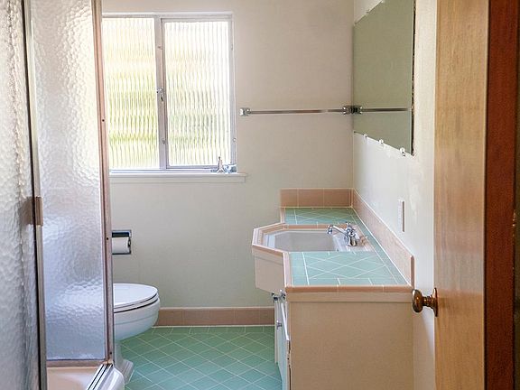 Large bathroom with tub and shower