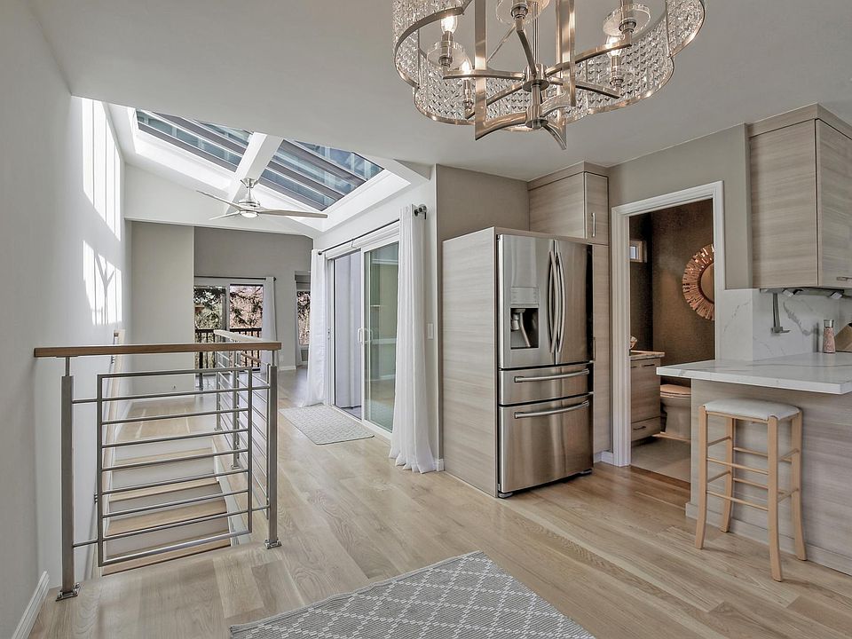View into Powder Room and Atrium Doors plus Skylights