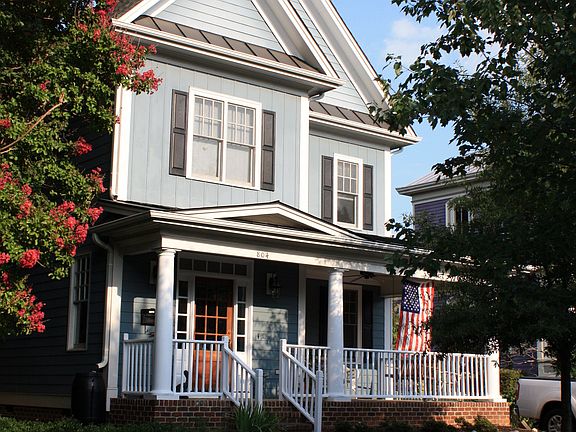 Large front porch - perfect for visiting with neighbors, bikers and walkers!
