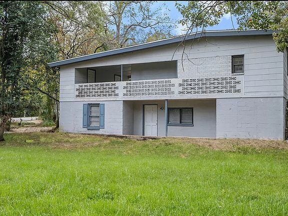 Can't wait to freshen up the paint and shutters once we get some tenants! And some landscaping.