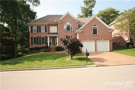 Beautiful all brick home with incredible landscaping.