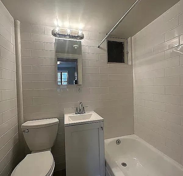 313 W 54th St #1FE — Photo 9