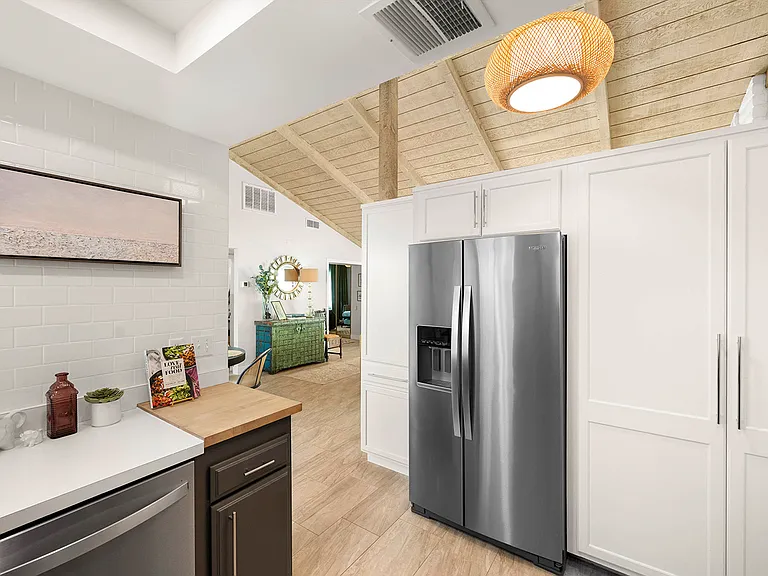 Kitchen area, pantry and dish storage.