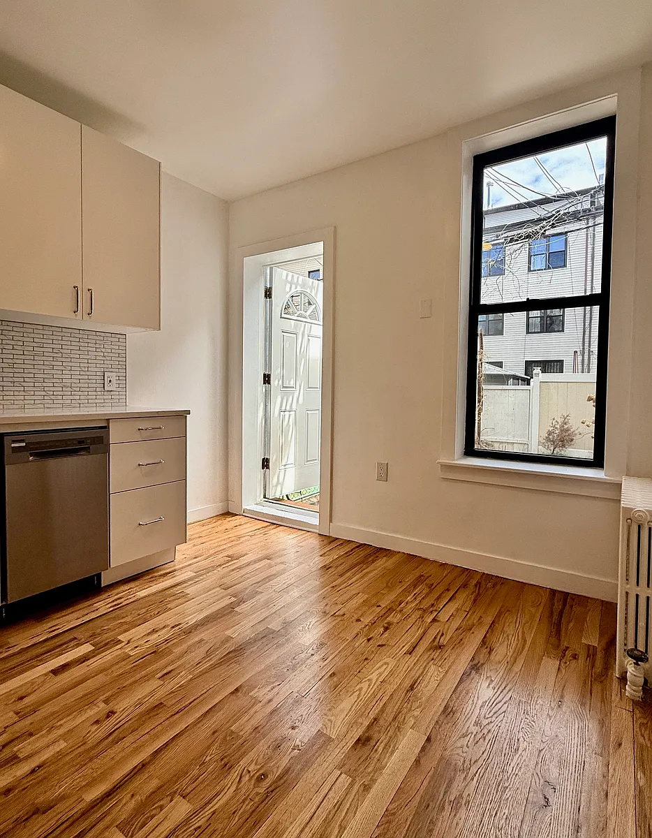 Building Photo - 1348 Putnam Ave #1-L