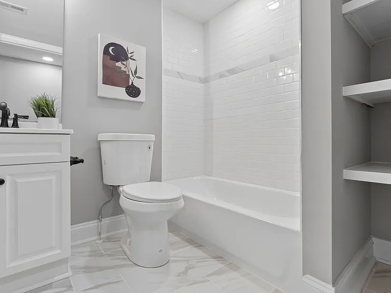 2nd Floor Bathroom (1) with shelving/storage