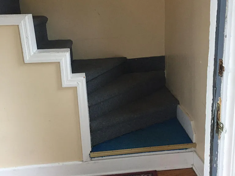 Entry stairs to Apt C upstairs