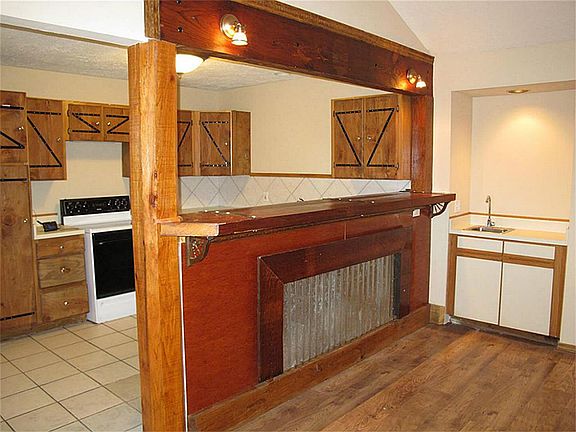 Large breakfast bar opens onto the family room/den!
