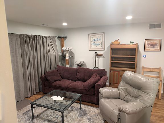 Living room with sliding doors to patio.