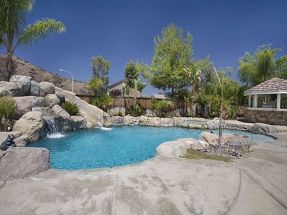 rock pool with waterfall and water slide,jacuzzi and gazebo 