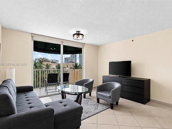 2nd image of 19701 E Country Club Dr #5604