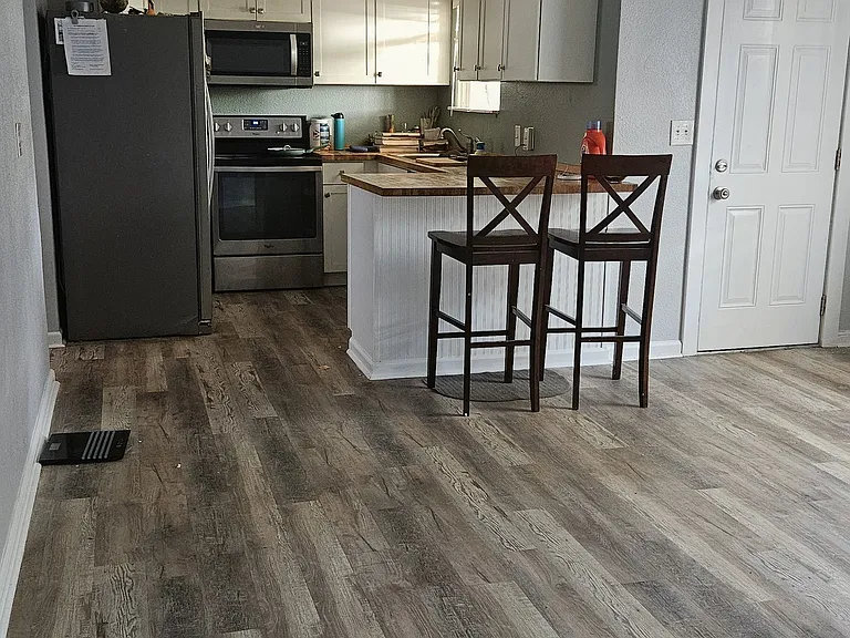 Apt B open concept living room/ bar top/ kitchen