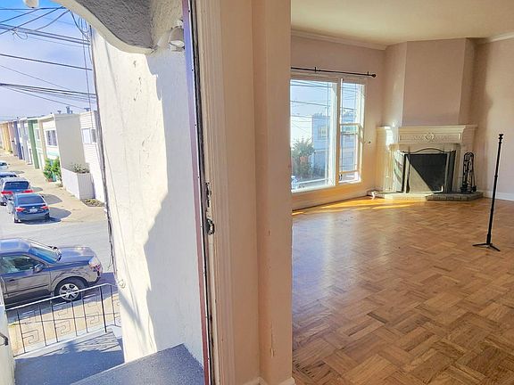 Front entrance into living room: 14' x 19'