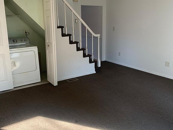 Living Room with Washer & Dryer
