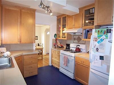 Remodeled kitchen with gas range.
