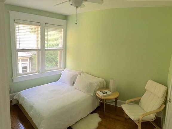 Identical spacious bedrooms with large windows and walk-ins.