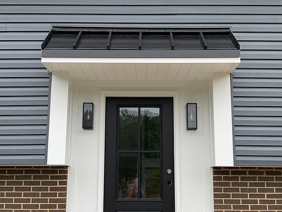 Exterior, front door w/ covered roof