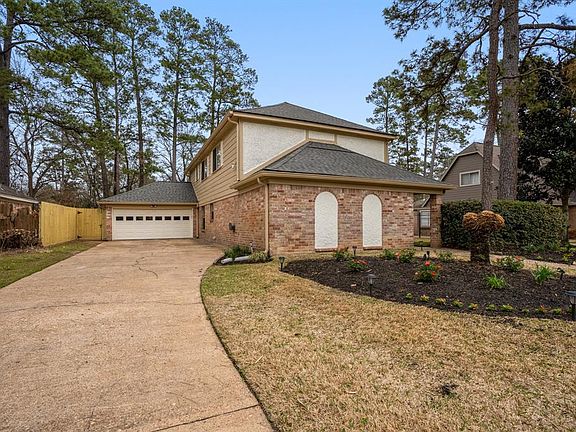 That's because the exterior was painted in 2018 & won't need a touch up for 7 years! The fence was also recently replaced! The garage is an oversized attached garage; however, it has a detached feel with it being located toward the back left of the h