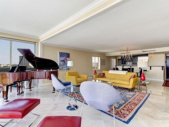Living room with view to kitchen