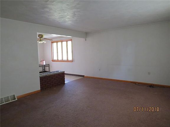 Semi open floor plan, living room into large eat in kitchen.