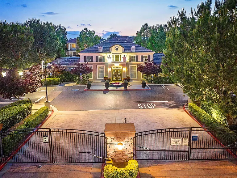 Dusk View of the Gated Clubhouse at Villas at the Gardens