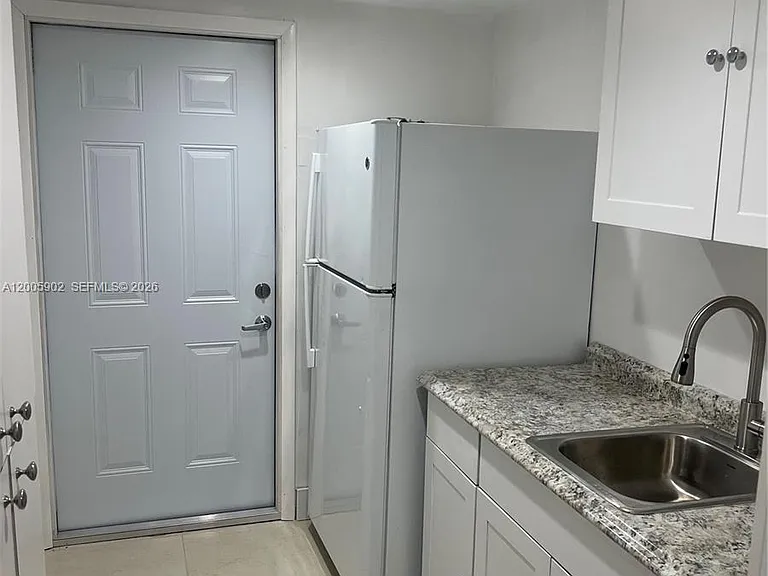 9945 SW 164th Ter #1 — Photo 3