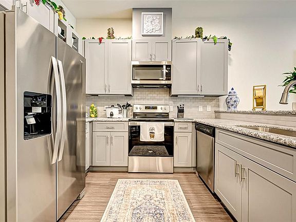 4th image of 6955 Turtlewood Dr #308